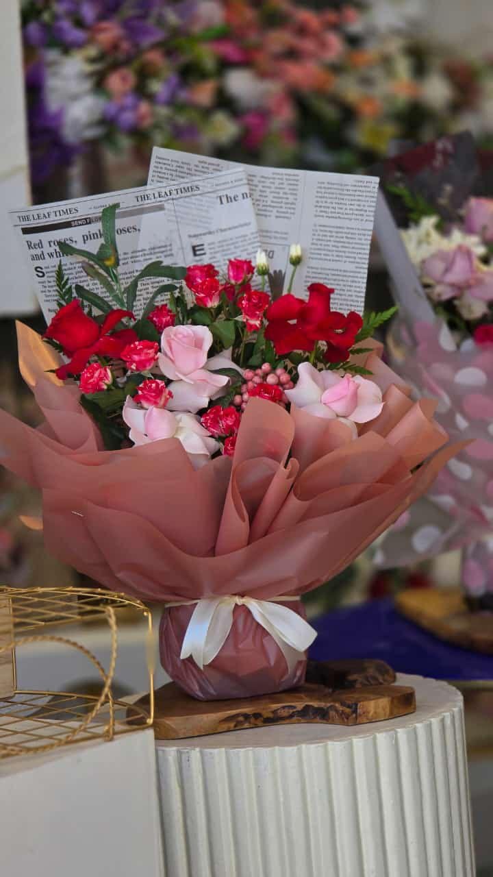 Flower Shop (12) Vintage Verse – Classic Rose Bouquet with Newsprint Accents - Image 1